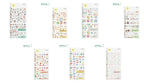 Seven MIDORI Sticker Collection sheets laid out on white: cats, cookies, flowers, interiors, food, soft shapes and words