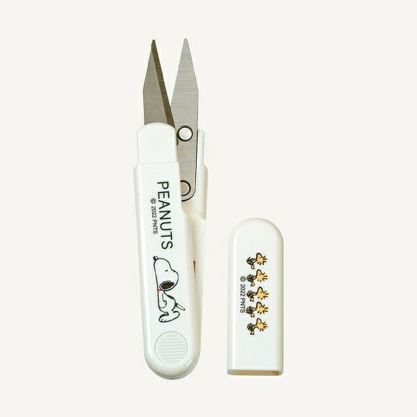Snoopy handy scissors open beside the slim cap on a white background