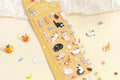 BGM icing seal sticker sheet, Cat Days design with embossed cats curled up around cups, stickers and small household objects