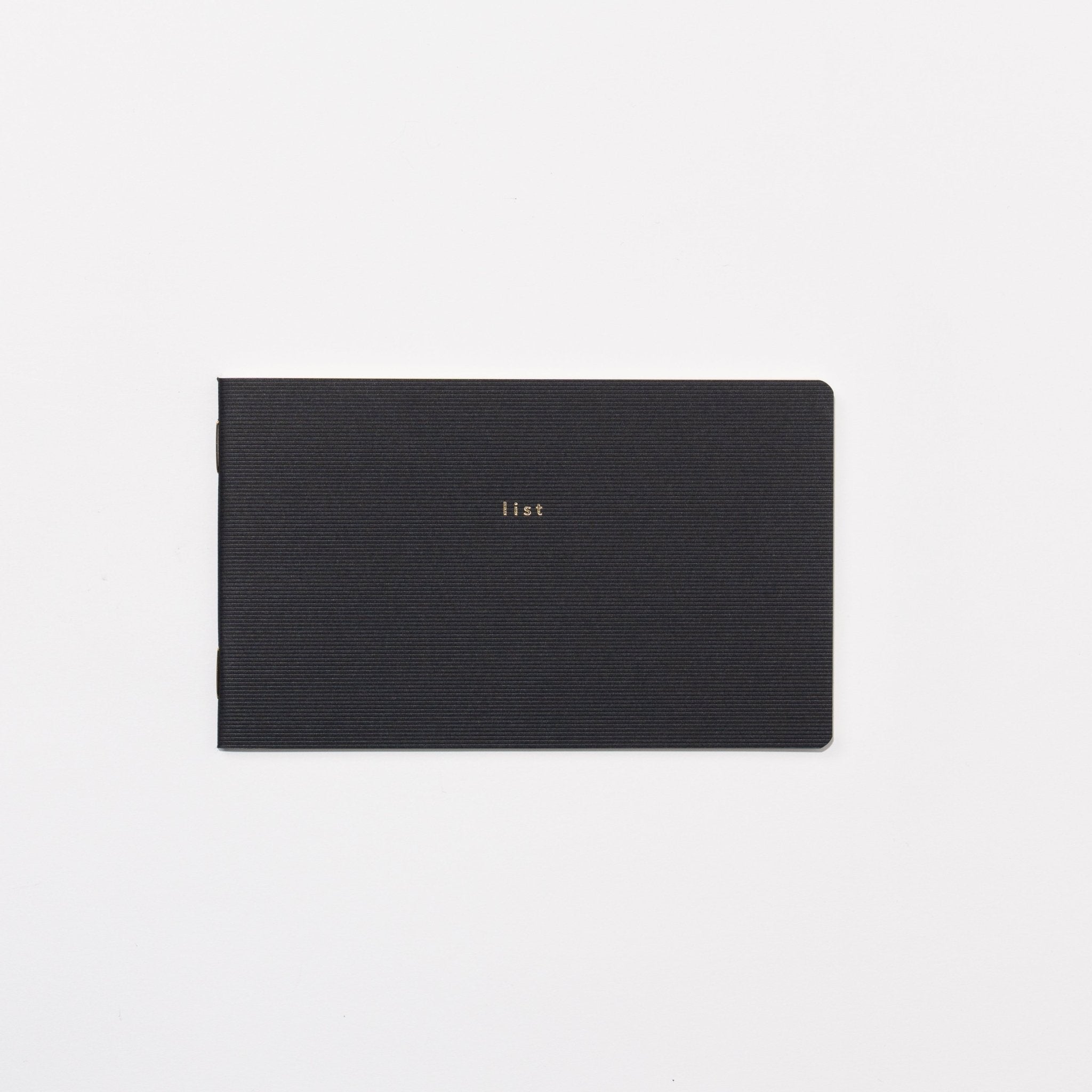 isshoni. Desk Notebook Slim / DAIGO