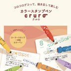 Kutsuwa Cruro Snoopy stamp pen used to stamp a page alongside handwriting