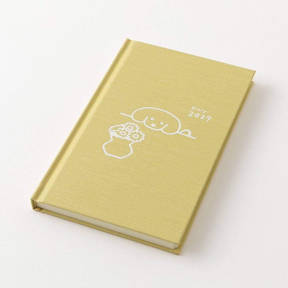 MIDORI Book Style Diary 2027 yellow dog cover open on a white surface